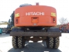 Ảnh của Máy xúc bánh lốp Hitachi EX125WD-5